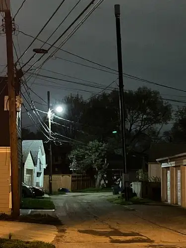 The quiet mystery of a nighttime alley.